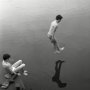 Юрий Имханицкий. Прыжок. 1991г. Фотобумага, ручная Ч\Б печать (печать МРФ). 450х305. Ф-120/Им